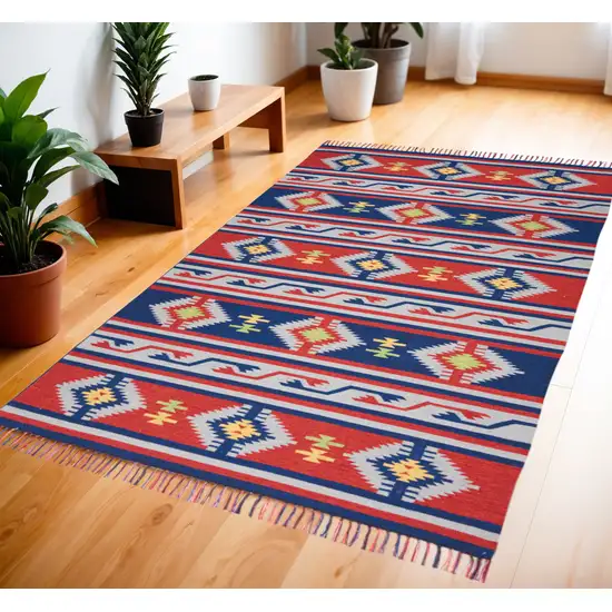 Blue and Red Southwestern Handmade Area Rug With Fringe Photo 1