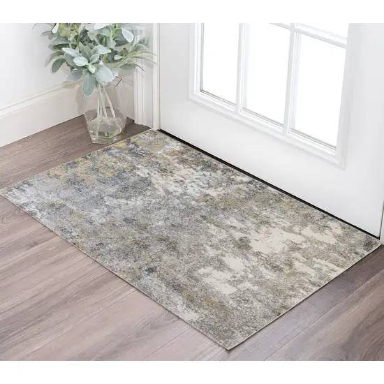 Ivory Blue and Yellow Abstract Power Loom Area Rug Photo 1