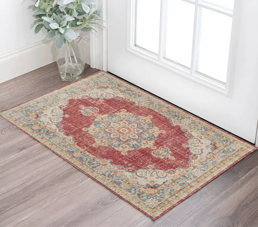 Ivory Red and Blue Medallion Power Loom Worn Faded Area Rug Photo 1