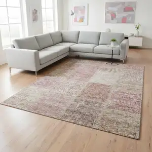 Photo of Blush And Beige Patchwork Washable Area Rug With UV Protection