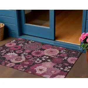 Photo of Blush And Black Floral Washable Indoor Outdoor Area Rug