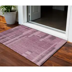 Photo of Blush And Brown Striped Washable Indoor Outdoor Area Rug