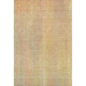 Photo of Blush And Gold Striped Washable Area Rug With UV Protection