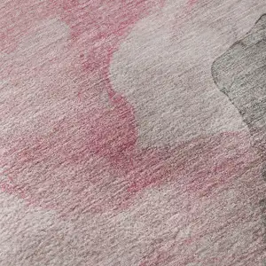 Photo of Blush And Gray Abstract Washable Area Rug With UV Protection