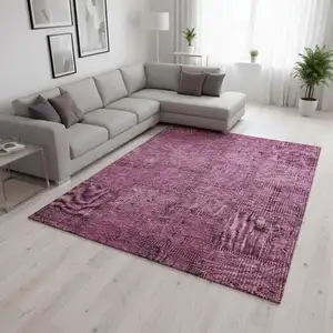 Photo of Blush And Gray Patchwork Washable Area Rug With UV Protection