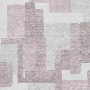 Photo of Blush And Ivory Abstract Geometric Washable Area Rug With UV Protection