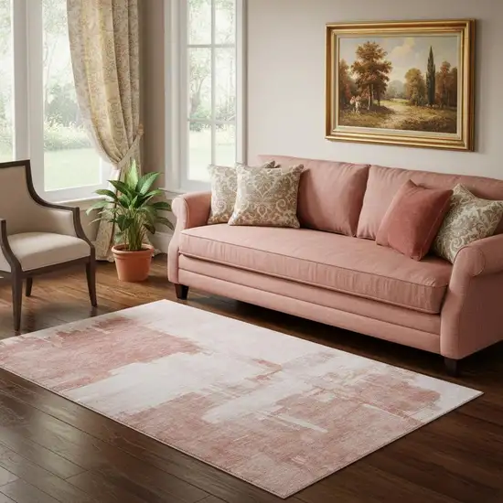 Blush And Ivory Abstract Washable Area Rug With UV Protection Photo 1