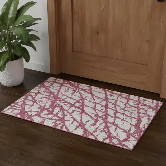 Blush And Ivory Abstract Washable Area Rug With UV Protection Photo 1