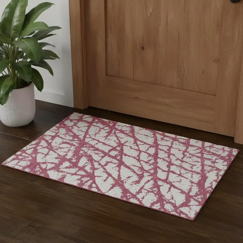 Blush And Ivory Abstract Washable Area Rug With UV Protection Photo 1