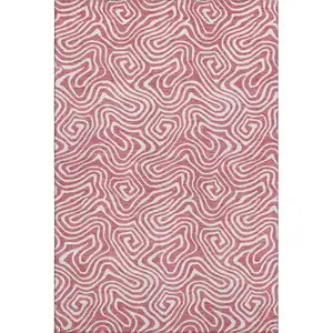 Photo of Blush And Ivory Abstract Washable Area Rug With UV Protection