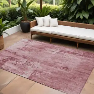 Photo of Blush And Ivory Abstract Washable Indoor Outdoor Area Rug