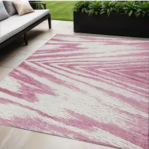 Photo of Blush And Ivory Abstract Washable Indoor Outdoor Area Rug
