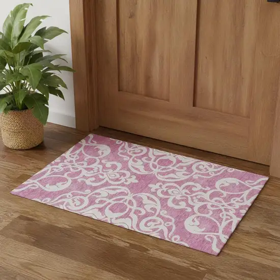 Blush And Ivory Damask Washable Area Rug With UV Protection Photo 1
