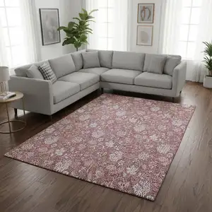 Photo of Blush And Ivory Floral Washable Area Rug With UV Protection