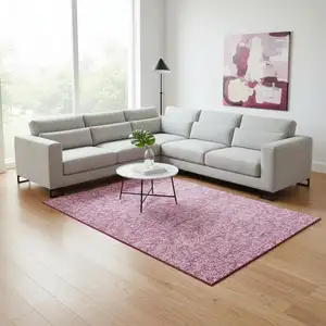 Photo of Blush And Ivory Floral Washable Area Rug With UV Protection