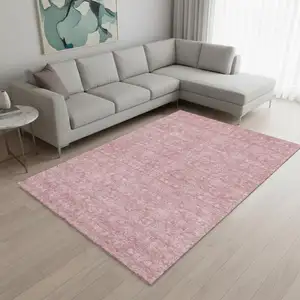 Photo of Blush And Ivory Floral Washable Area Rug With UV Protection