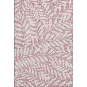 Photo of Blush And Ivory Floral Washable Area Rug With UV Protection