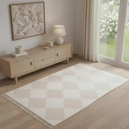 Blush And Ivory Geometric Washable Area Rug With Fringe Photo 1