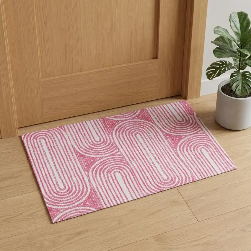 Blush And Ivory Geometric Distressed Washable Area Rug With UV Protection Photo 1