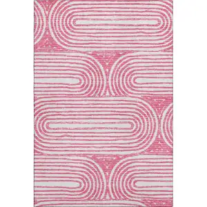 Photo of Blush And Ivory Geometric Washable Area Rug With UV Protection