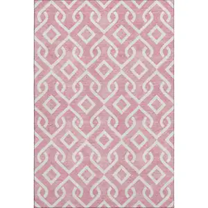 Photo of Blush And Ivory Geometric Washable Area Rug With UV Protection