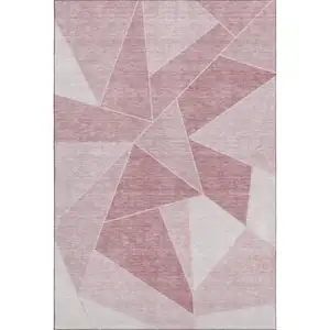 Photo of Blush And Ivory Geometric Washable Area Rug With UV Protection