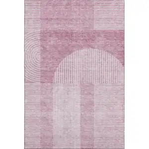 Photo of Blush And Ivory Geometric Washable Area Rug With UV Protection