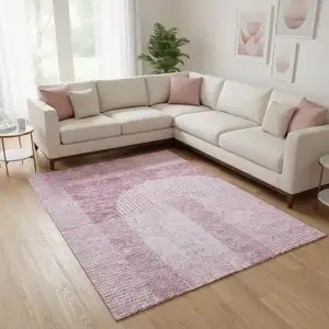 Photo of Blush And Ivory Geometric Washable Area Rug With UV Protection