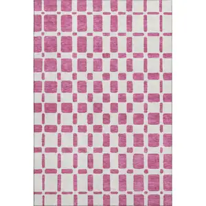Photo of Blush And Ivory Geometric Washable Area Rug With UV Protection