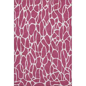 Photo of Blush And Ivory Geometric Washable Area Rug With UV Protection