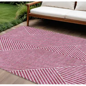 Photo of Blush And Ivory Geometric Washable Indoor Outdoor Area Rug