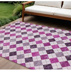 Photo of Blush And Ivory Geometric Washable Indoor Outdoor Area Rug