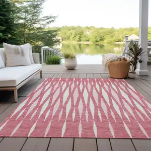 Photo of Blush And Ivory Geometric Washable Indoor Outdoor Area Rug
