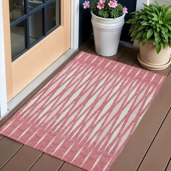 Blush And Ivory Geometric Washable Indoor Outdoor Area Rug Photo 1