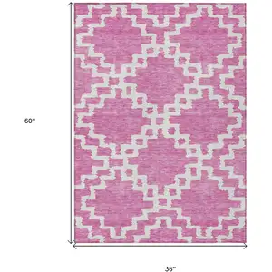 Photo of Blush And Ivory Geometric Washable Indoor Outdoor Area Rug