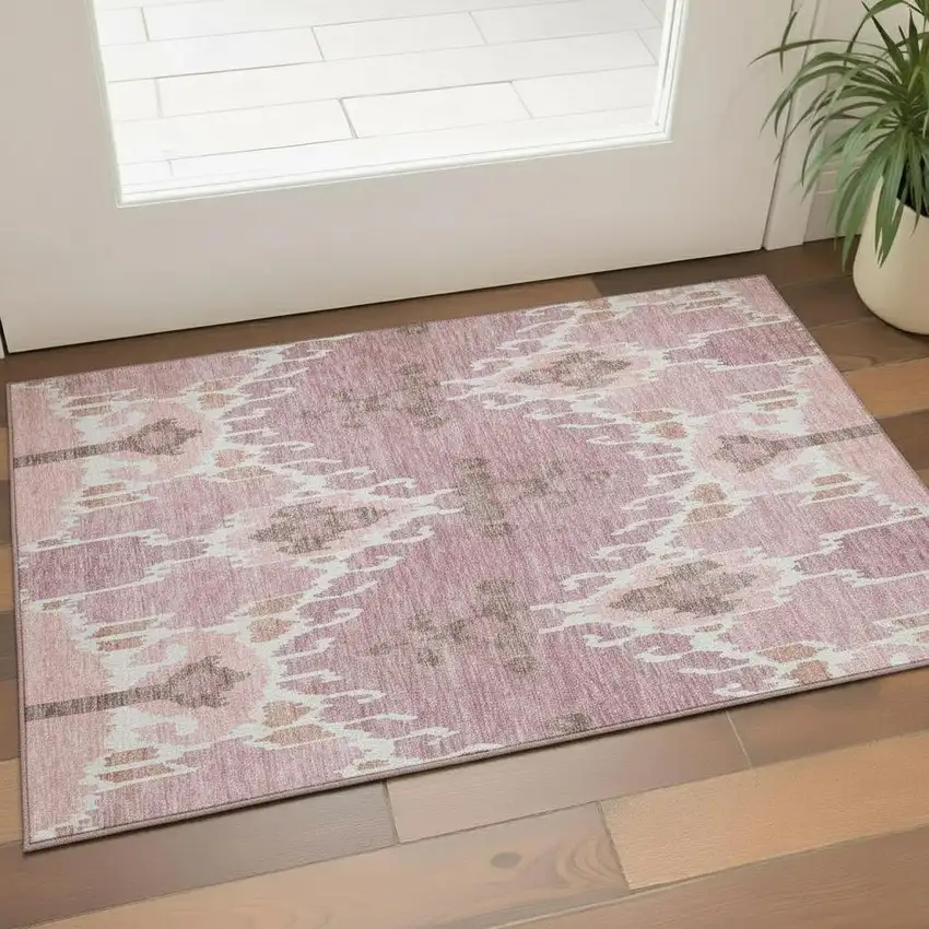 Blush And Ivory Ikat Washable Area Rug With UV Protection Photo 1
