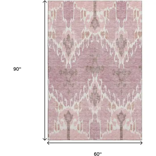 Blush And Ivory Ikat Washable Area Rug With UV Protection Photo 3
