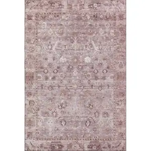 Photo of Blush And Ivory Oriental Washable Area Rug With UV Protection