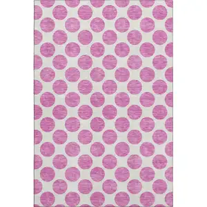 Photo of Blush And Ivory Polka Dot Washable Area Rug With UV Protection
