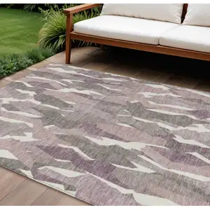 Photo of Blush And Ivory Striped Washable Indoor Outdoor Area Rug