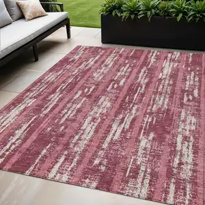 Photo of Blush And Ivory Striped Washable Indoor Outdoor Area Rug