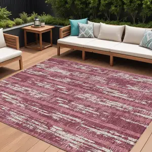 Photo of Blush And Ivory Striped Washable Indoor Outdoor Area Rug