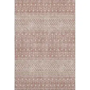 Photo of Blush And Ivory Tribal Washable Area Rug With UV Protection