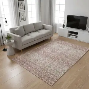 Photo of Blush And Ivory Tribal Washable Area Rug With UV Protection