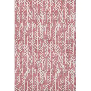 Photo of Blush And Ivory Tribal Washable Area Rug With UV Protection