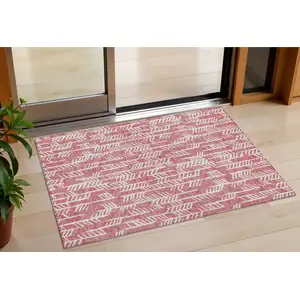Photo of Blush And Ivory Tribal Washable Indoor Outdoor Area Rug
