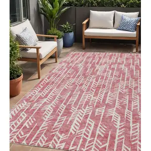 Photo of Blush And Ivory Tribal Washable Indoor Outdoor Area Rug
