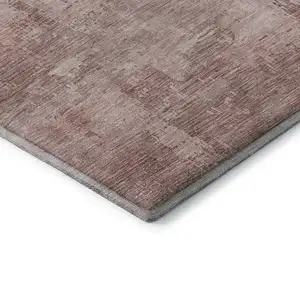 Photo of Blush And Mauve Abstract Washable Area Rug With UV Protection
