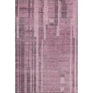 Photo of Blush And Mauve Striped Washable Area Rug With UV Protection