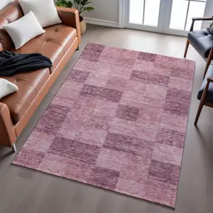 Photo of Blush And Pink Geometric Washable Area Rug With UV Protection